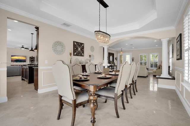11844 Foxbriar Lake Trl, Boynton Beach, FL 33473 - dining space with ornate columns, light marble finish flooring, arched walkways, crown molding, and a decorative wall