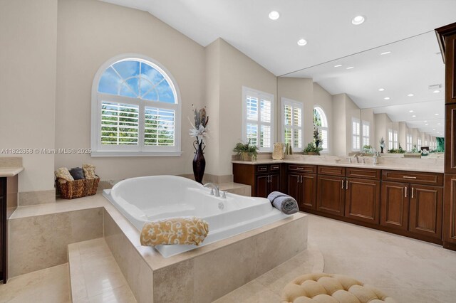 11844 Foxbriar Lake Trl, Boynton Beach, FL 33473 - full bath with vaulted ceiling, vanity, a bath, and recessed lighting