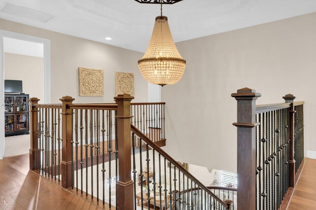 11844 Foxbriar Lake Trl, Boynton Beach, FL 33473 - stairway with wood finished floors, a chandelier, and recessed lighting