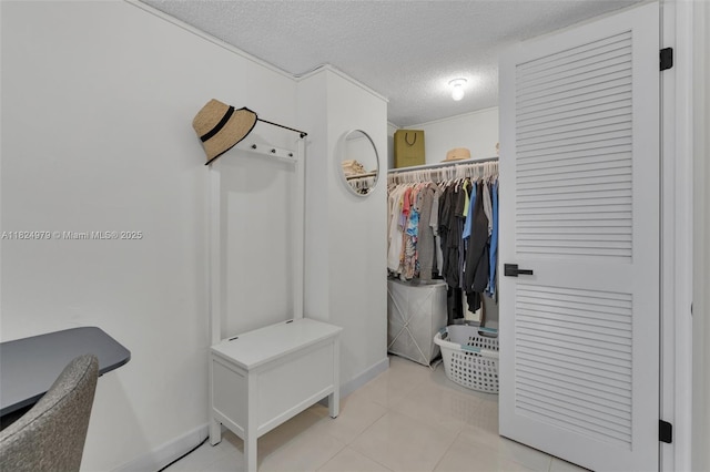 2000 S Ocean Blvd Unit 11M, Lauderdale By The Sea, FL 33062 - walk in closet featuring light tile patterned flooring