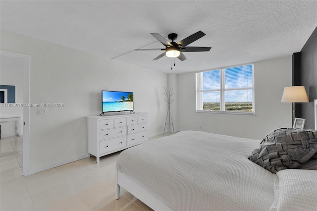 2000 S Ocean Blvd Unit 11M, Lauderdale By The Sea, FL 33062 - bedroom with light tile patterned floors and ceiling fan