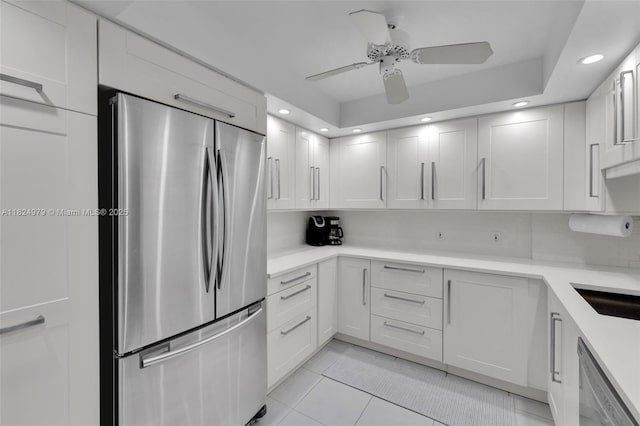 2000 S Ocean Blvd Unit 11M, Lauderdale By The Sea, FL 33062 - kitchen featuring freestanding refrigerator, dishwasher, light countertops, light tile patterned floors, and a ceiling fan