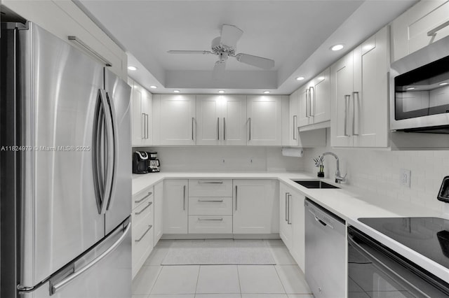 2000 S Ocean Blvd Unit 11M, Lauderdale By The Sea, FL 33062 - kitchen featuring appliances with stainless steel finishes, ceiling fan, light tile patterned floors, recessed lighting, and backsplash