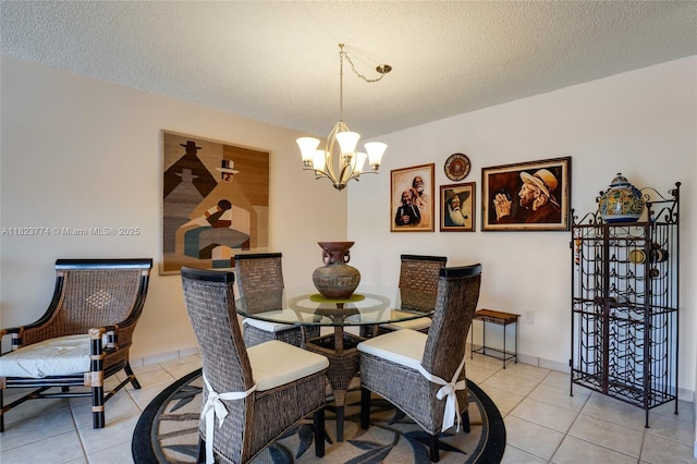 5800 SW 127th Ave Unit 2307, Miami, FL 33183 - dining area with light tile patterned flooring, a chandelier, and a textured ceiling