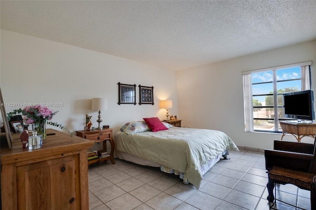 5800 SW 127th Ave Unit 2307, Miami, FL 33183 - bedroom featuring light tile patterned floors and a textured ceiling