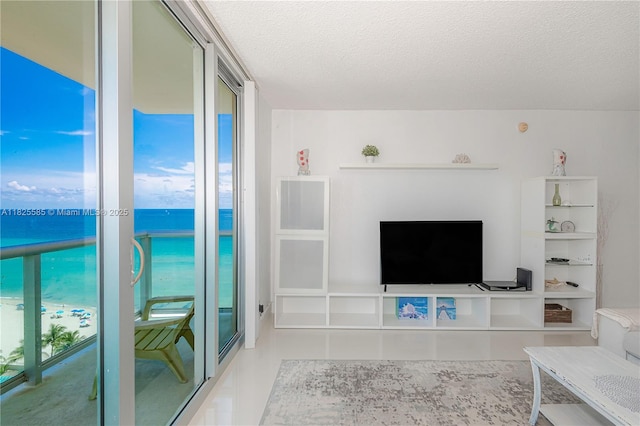 3901 S Ocean Dr Unit 12E, Hollywood, FL 33019 - living area with a textured ceiling