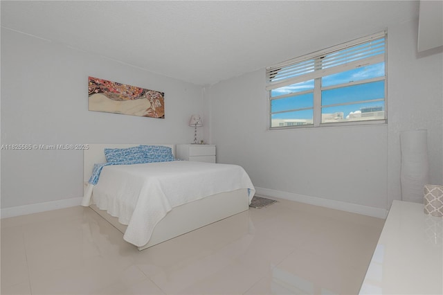 3901 S Ocean Dr Unit 12E, Hollywood, FL 33019 - bedroom with baseboards