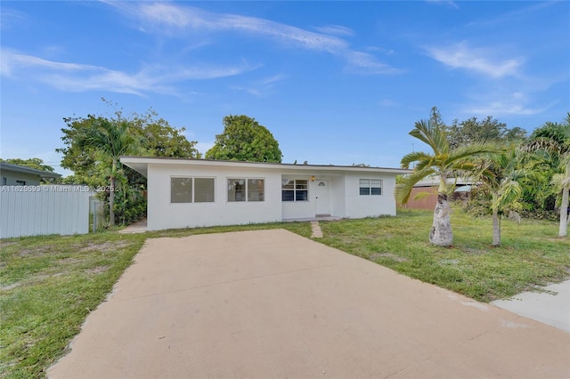 5615 Branch St, Hollywood, FL 33021 - view of front of home featuring stucco siding and driveway