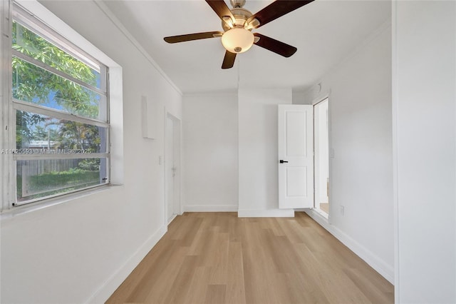 5615 Branch St, Hollywood, FL 33021 - spare room featuring light wood-type flooring, ornamental molding, and ceiling fan