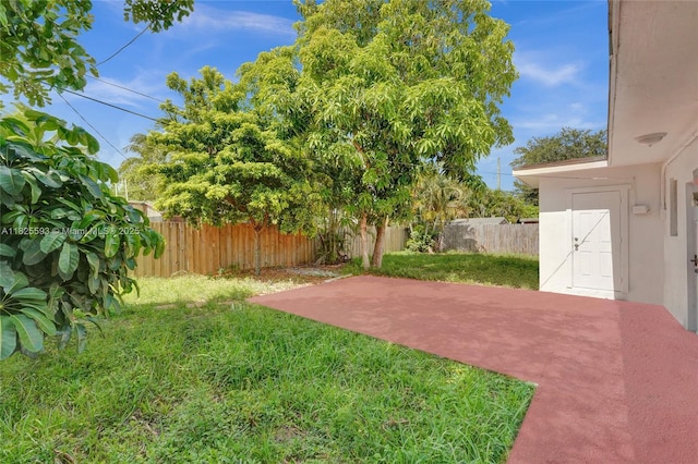 5615 Branch St, Hollywood, FL 33021 - fenced backyard with a patio area