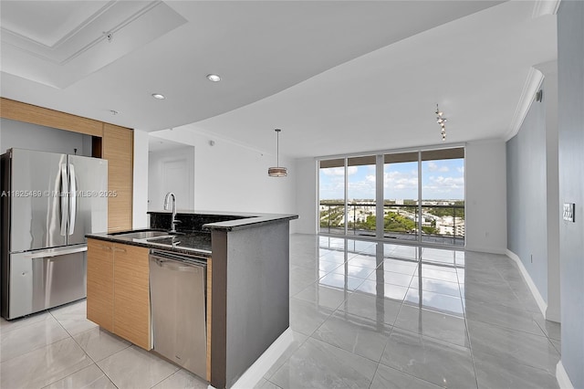 1 N Ocean Blvd Unit 1211, Pompano Beach, FL 33062 - kitchen featuring stainless steel appliances, modern cabinets, floor to ceiling windows, open floor plan, and ornamental molding
