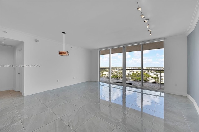 1 N Ocean Blvd Unit 1211, Pompano Beach, FL 33062 - unfurnished room featuring a wall of windows, ornamental molding, and rail lighting