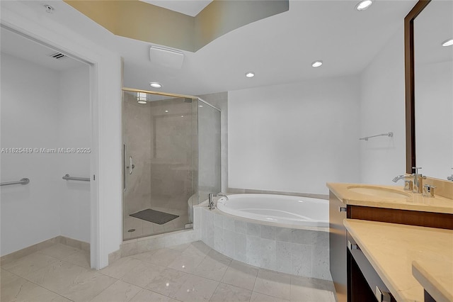 1 N Ocean Blvd Unit 1211, Pompano Beach, FL 33062 - bathroom featuring vanity, a garden tub, a stall shower, and recessed lighting
