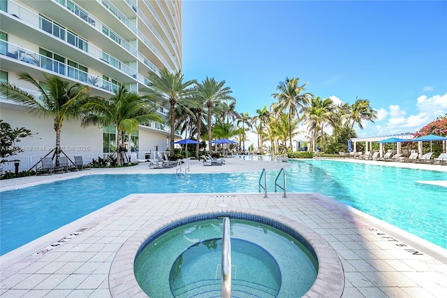 1 N Ocean Blvd Unit 1211, Pompano Beach, FL 33062 - community pool featuring a community hot tub and a patio