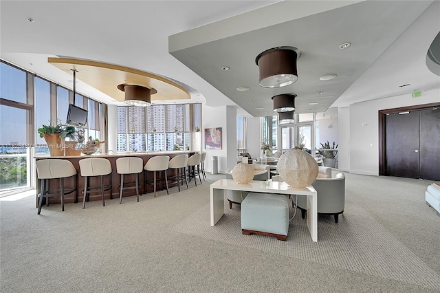 1 N Ocean Blvd Unit 1211, Pompano Beach, FL 33062 - carpeted dining area featuring a community bar