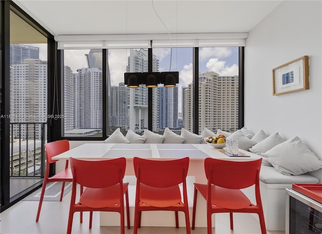 520 Brickell Key Dr Unit A1421, Miami, FL 33131 - dining area featuring floor to ceiling windows and a view of skyline