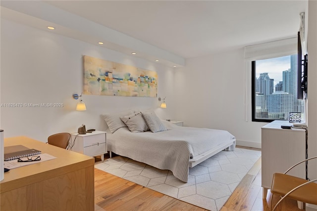 520 Brickell Key Dr Unit A1421, Miami, FL 33131 - bedroom featuring light wood finished floors and recessed lighting
