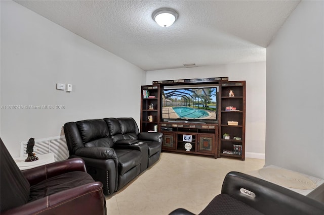 10967 NW 12th Dr, Coral Springs, FL 33071 - home theater featuring a textured ceiling
