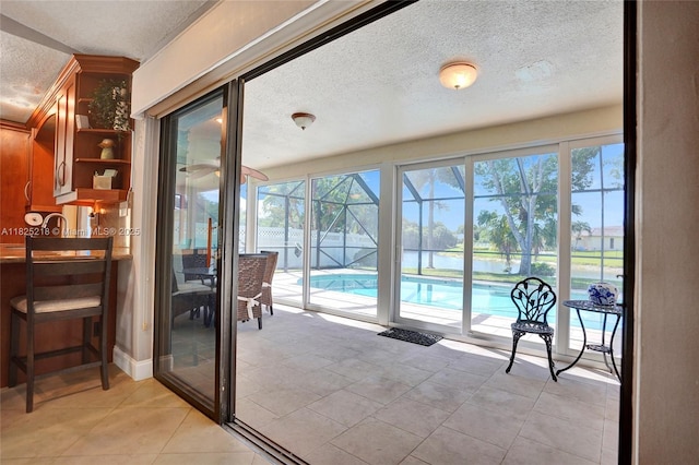 10967 NW 12th Dr, Coral Springs, FL 33071 - sunroom / solarium with a water view