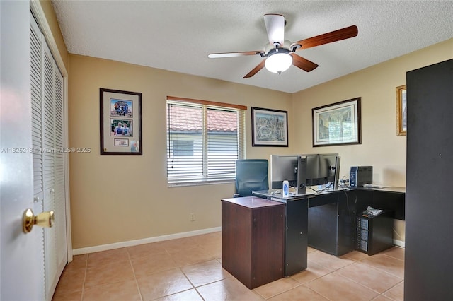 10967 NW 12th Dr, Coral Springs, FL 33071 - home office with a ceiling fan, light tile patterned floors, and a textured ceiling