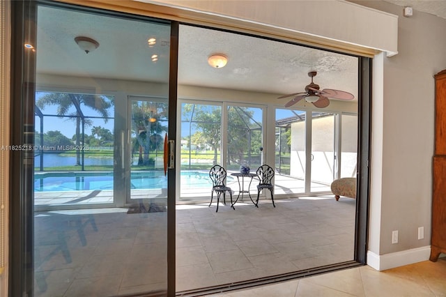 10967 NW 12th Dr, Coral Springs, FL 33071 - sunroom with a ceiling fan and a water view