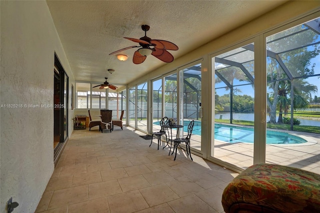 10967 NW 12th Dr, Coral Springs, FL 33071 - sunroom with a ceiling fan, a water view, and a pool
