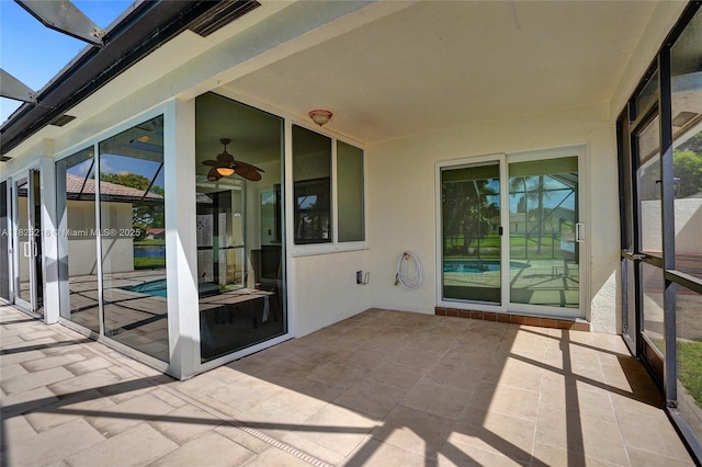 10967 NW 12th Dr, Coral Springs, FL 33071 - unfurnished sunroom featuring ceiling fan