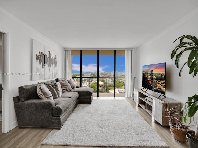 1470 NE 123rd St Unit Aph9, North Miami, FL 33161 - living room with floor to ceiling windows and wood finished floors