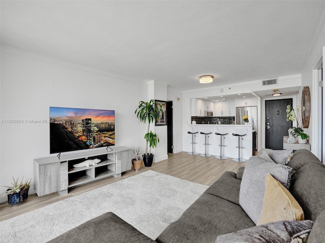 1470 NE 123rd St Unit Aph9, North Miami, FL 33161 - living room featuring light wood-style flooring