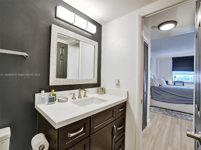 1470 NE 123rd St Unit Aph9, North Miami, FL 33161 - bathroom featuring vanity and wood finished floors