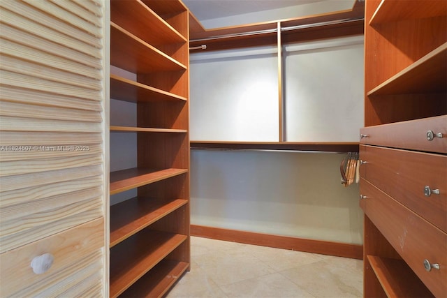 1670 Bay Rd Unit 2D, Miami Beach, FL 33139 - walk in closet with tile patterned floors