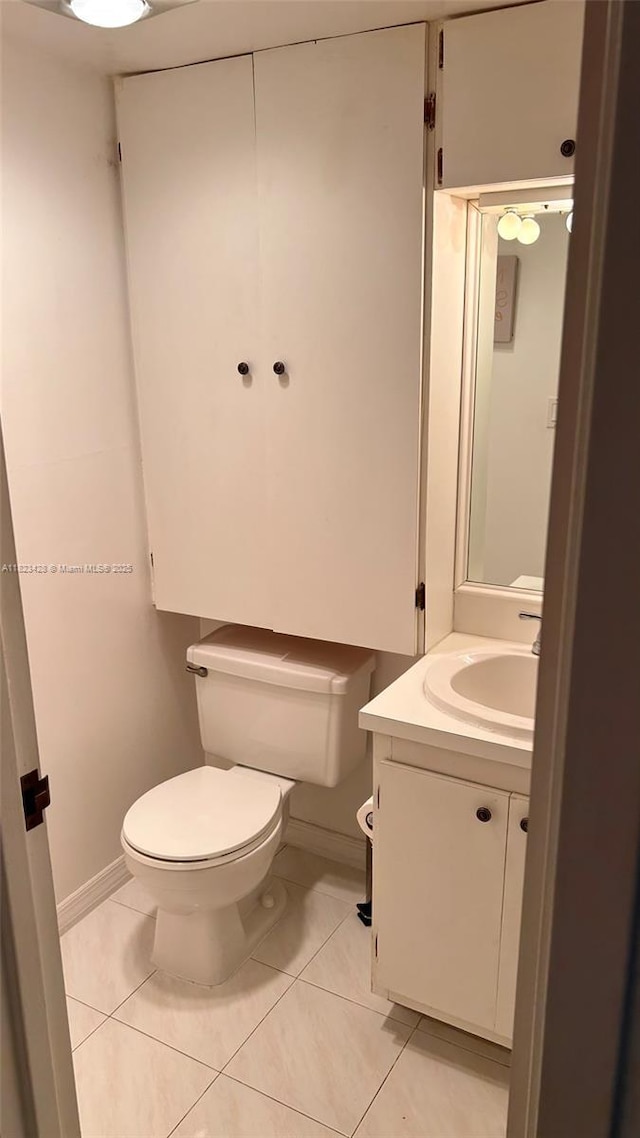100 Bayview Dr Unit 1030, Sunny Isles Beach, FL 33160 - half bath with vanity and tile patterned floors