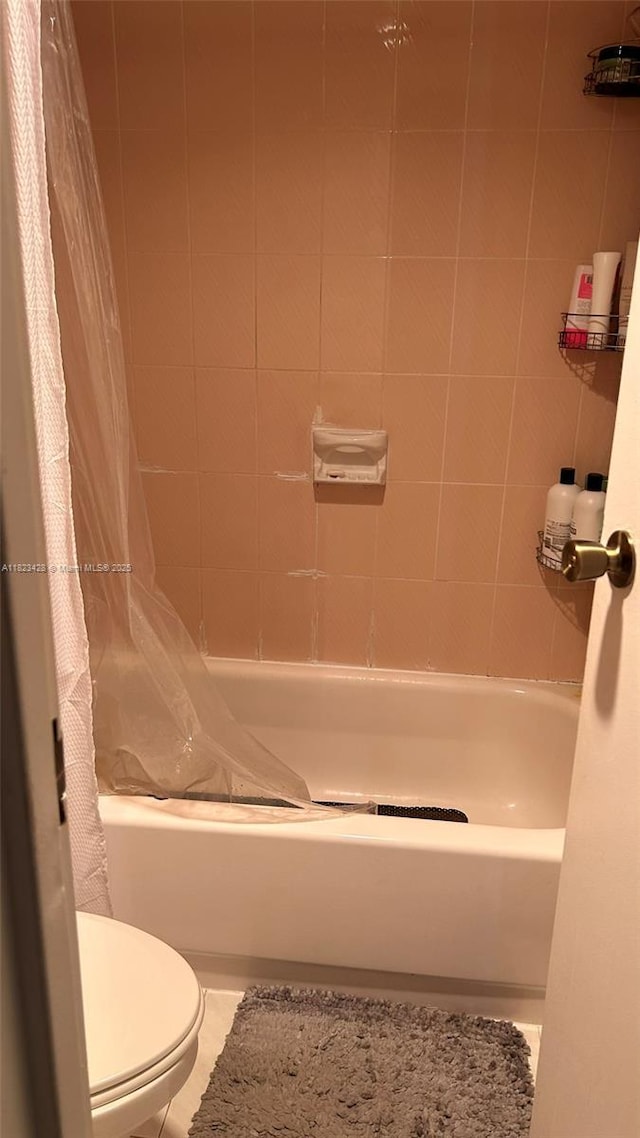 100 Bayview Dr Unit 1030, Sunny Isles Beach, FL 33160 - bathroom featuring shower / bath combo and tile patterned flooring