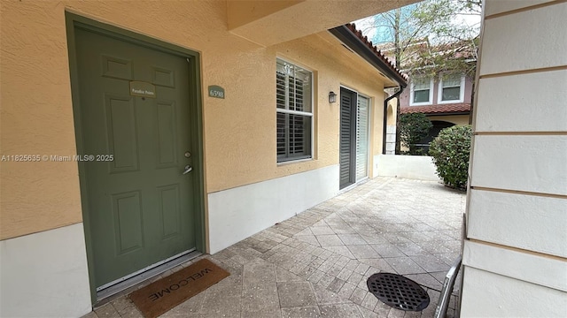 6598 W Sample Rd Unit 6598, Coral Springs, FL 33067 - view of exterior entry featuring stucco siding
