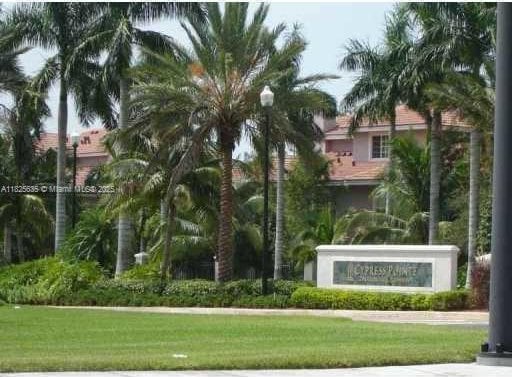 6598 W Sample Rd Unit 6598, Coral Springs, FL 33067 - community sign with a lawn