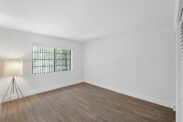 8261 SW 128th St Unit 215, Pinecrest, FL 33156 - spare room featuring wood finished floors