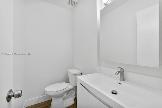 8261 SW 128th St Unit 215, Pinecrest, FL 33156 - half bathroom with vanity and wood finished floors
