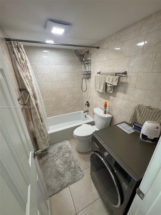 1428 SE 4th Ave Unit 103, Deerfield Beach, FL 33441 - bathroom with washer / clothes dryer, tile patterned floors, shower / bath combo, and tile walls