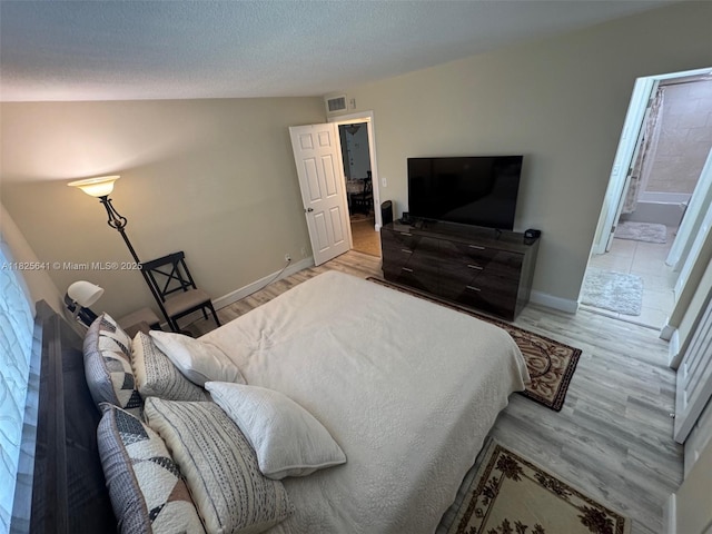 1428 SE 4th Ave Unit 103, Deerfield Beach, FL 33441 - bedroom featuring wood finished floors and baseboards