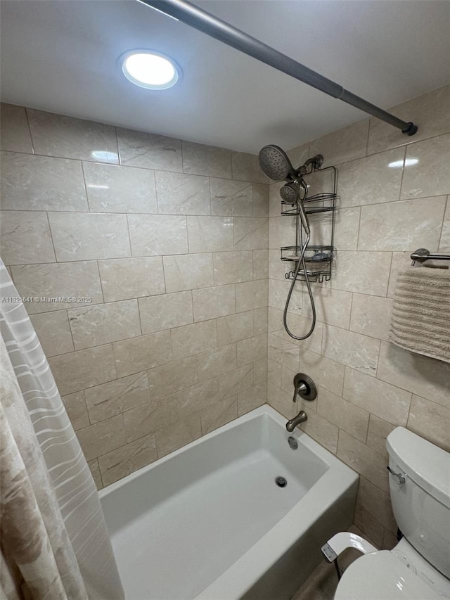 1428 SE 4th Ave Unit 103, Deerfield Beach, FL 33441 - bathroom featuring shower / bath combination with curtain