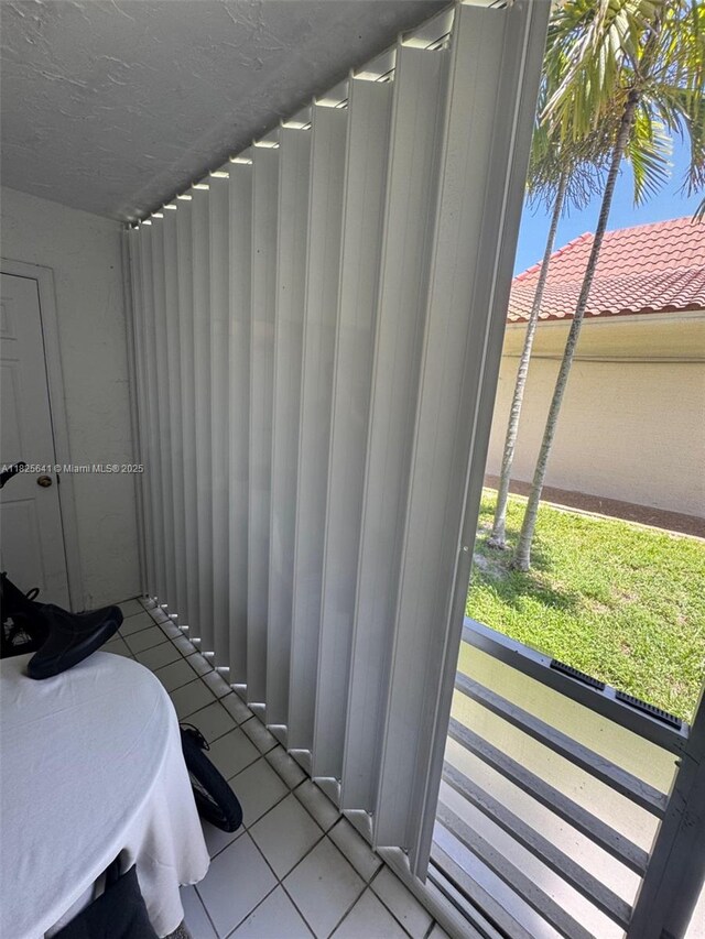 1428 SE 4th Ave Unit 103, Deerfield Beach, FL 33441 - bedroom featuring light tile patterned floors