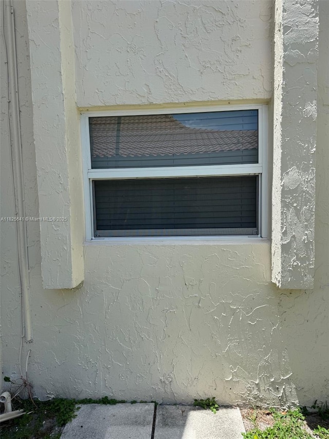 1428 SE 4th Ave Unit 103, Deerfield Beach, FL 33441 - exterior view of stucco siding