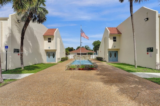 1428 SE 4th Ave Unit 103, Deerfield Beach, FL 33441 - view of home's community with driveway