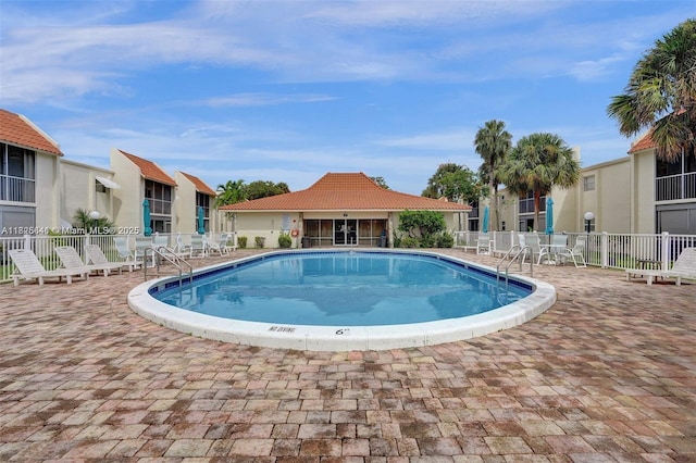 1428 SE 4th Ave Unit 103, Deerfield Beach, FL 33441 - community pool with a patio area