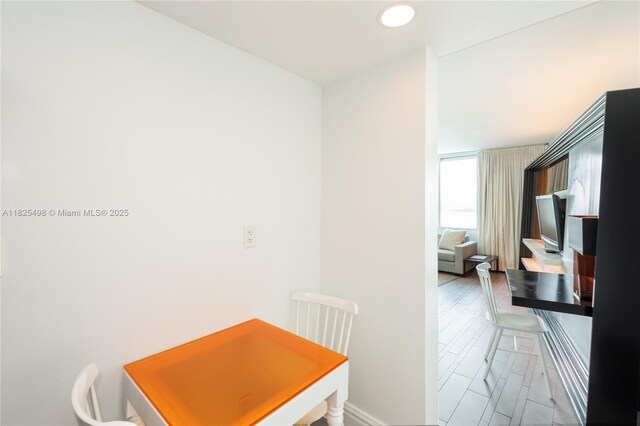 1100 W Ave Unit 506, Miami Beach, FL 33139 - dining space featuring baseboards