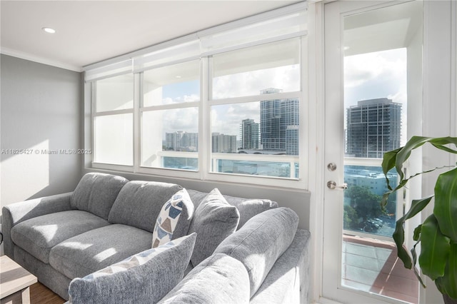 6770 Indian Creek Dr Unit 14C, Miami Beach, FL 33141 - living area with ornamental molding, a city view, and recessed lighting