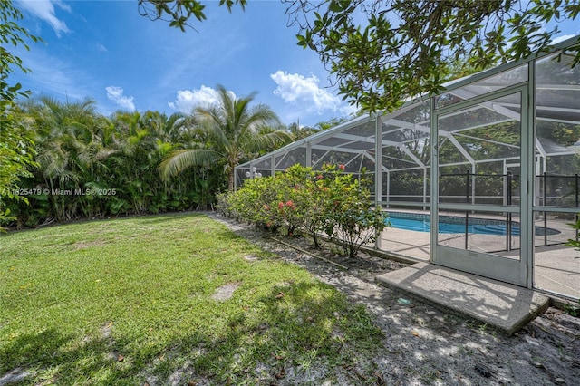 1381 SW Leisure Ln, Port St Lucie, FL 34953 - view of green lawn featuring an outdoor pool, a patio, and glass enclosure