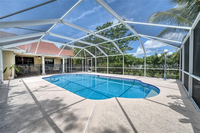 1381 SW Leisure Ln, Port St Lucie, FL 34953 - swimming pool featuring a patio and a lanai