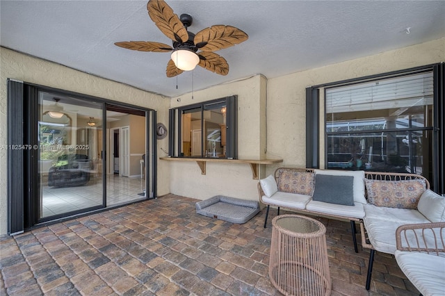 1381 SW Leisure Ln, Port St Lucie, FL 34953 - view of patio / terrace with ceiling fan and an outdoor hangout area