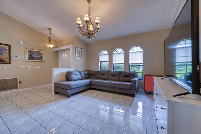 1381 SW Leisure Ln, Port St Lucie, FL 34953 - living room featuring lofted ceiling, light tile patterned floors, a chandelier, plenty of natural light, and a textured ceiling